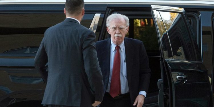John Bolton surrenders to face charges of sharing classified information
