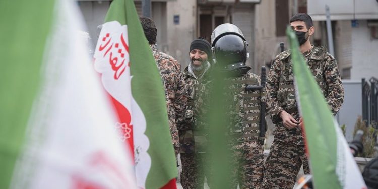 Iran president vows defiance as protests build against regime amid US military build up